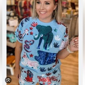 Queen of sparkles NWT animal print top size small